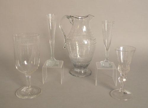 Appraisal: Anglo-Irish engraved glass pitcher together with flutes and a goblet