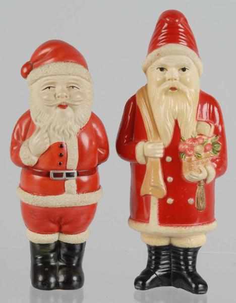 Appraisal: Lot of Celluloid Santas Description Includes one holding a basket