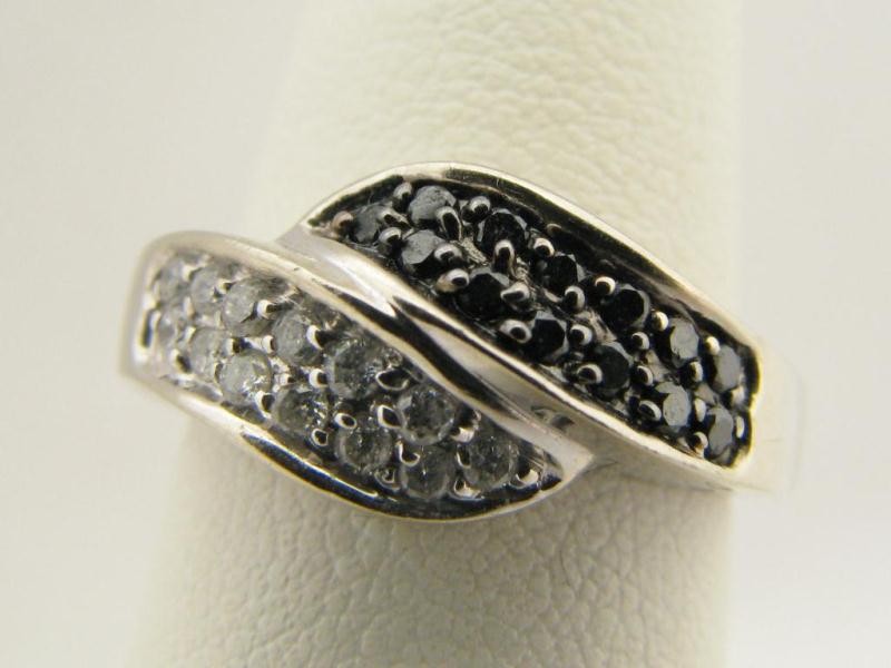 Appraisal: Lady's K White Gold Black White Diamond Ring in freeform