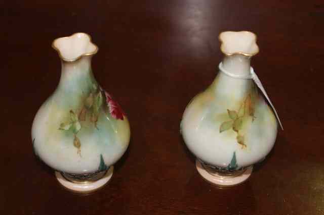 Appraisal: A PAIR OF ROYAL WORCESTER BLUSH IVORY SMALL VASES painted