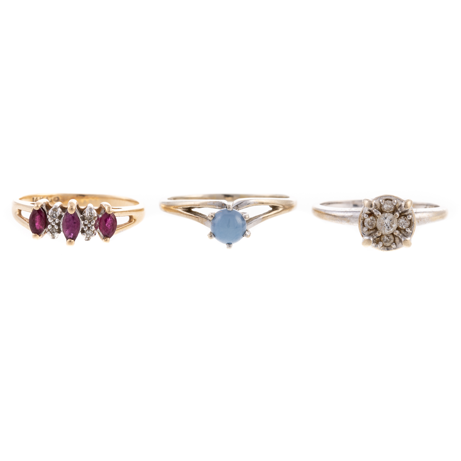 Appraisal: A TRIO OF GEMSTONE DIAMOND RINGS IN GOLD K white