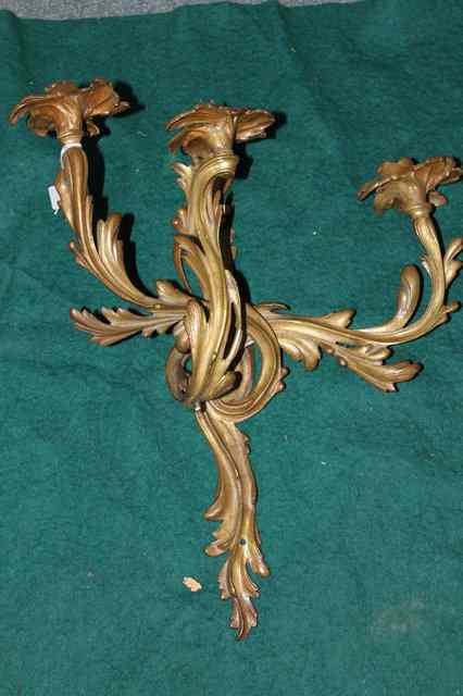 Appraisal: A GILT BRASS ROCOCO STYLE THREE BRANCH WALL LIGHT of