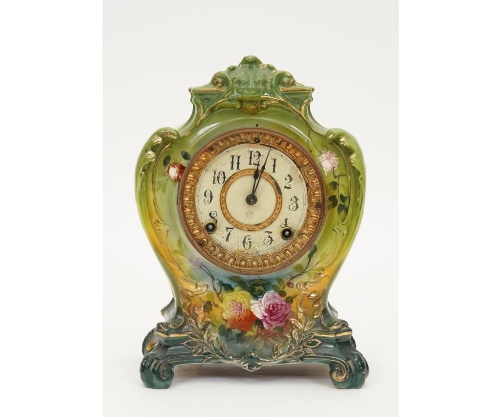 Appraisal: Ansonia Royal Bonn mantel clock with grotesque face and floral