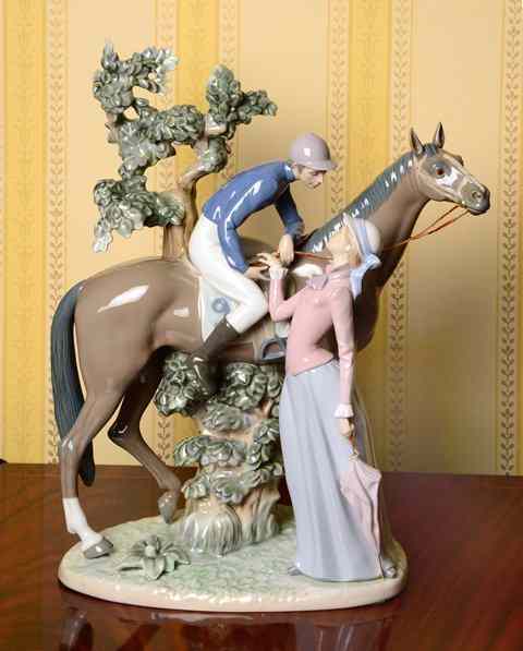 Appraisal: A LLADRO PORCELAIN SCULPTURE of a mounted jockey and his