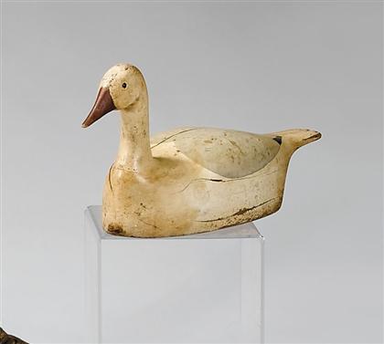 Appraisal: Carved and painted goose decoy th century With tack eyes