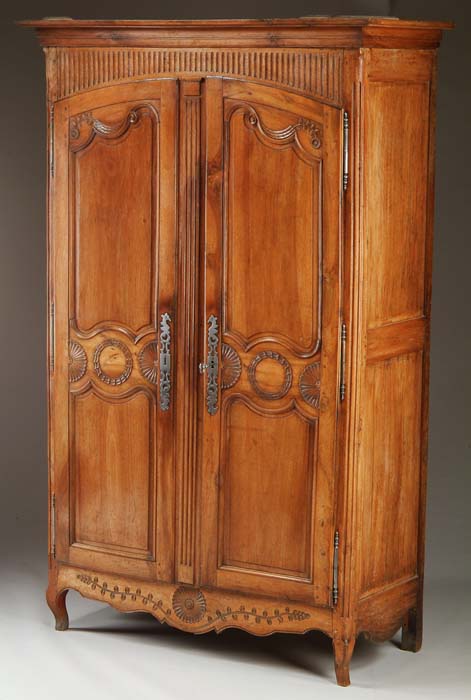 Appraisal: LARGE TH CENTURY FRENCH WALNUT ARMOIRE Free standing armoire has