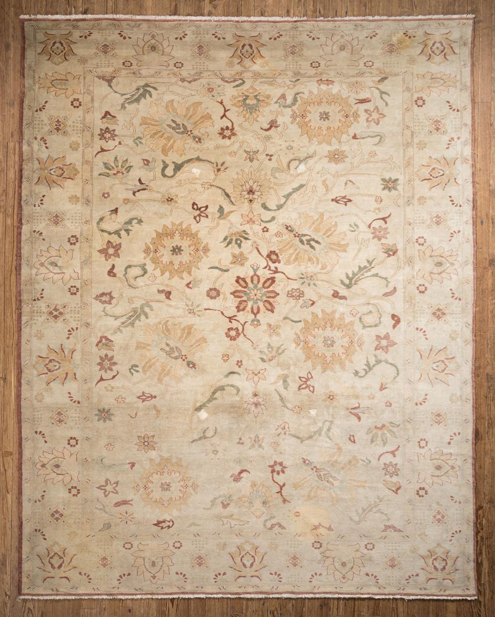 Appraisal: Sultananbad Carpet khaki ground stylized floral design ft x ft