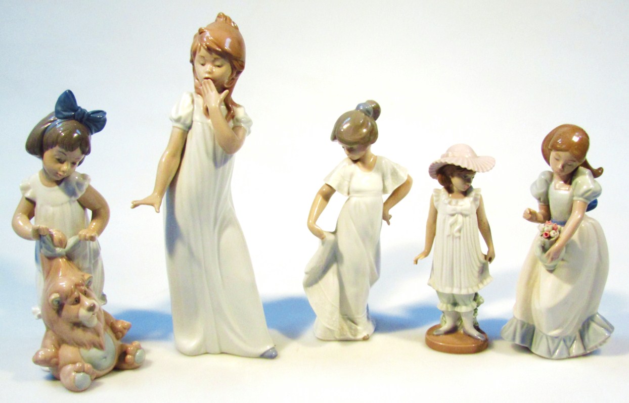 Appraisal: A collection of Nao figures to include a young girl