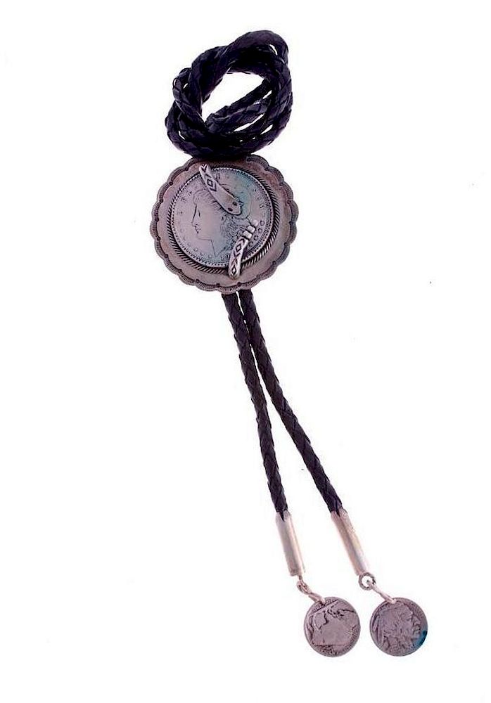 Appraisal: NAVAJO BOLOS Vintage and pawn Navajo bolo tie silver dollar