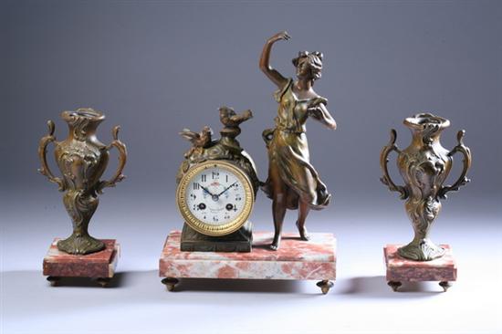 Appraisal: FRENCH ART NOUVEAU PATINATED METAL CLOCK GARNITURE Early th century