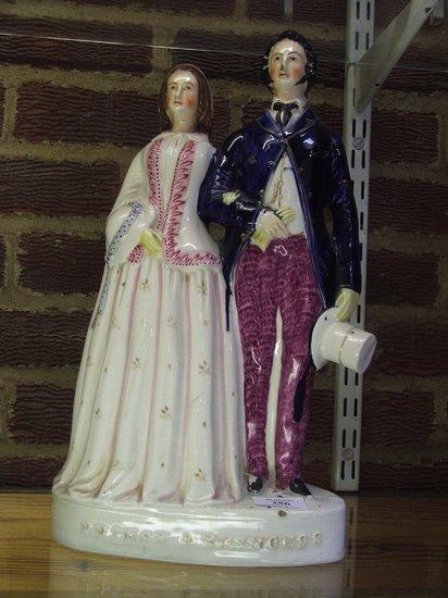 Appraisal: A STAFFORDSHIRE FIGURE GROUP of 'Prince Albert and Queen Victoria'