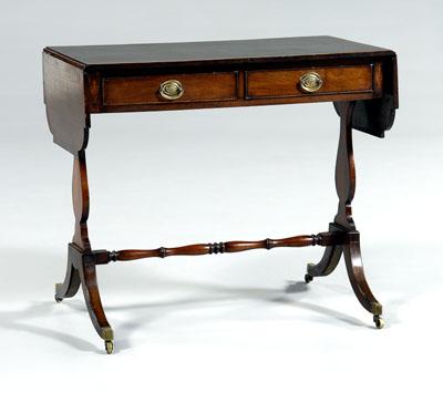 Appraisal: Regency style diminutive sofa table inlaid mahogany two dovetailed drawers