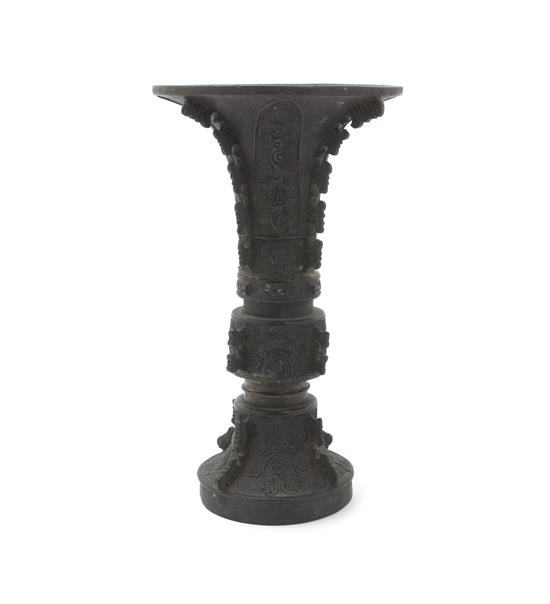 Appraisal: Sale Lot An Archaistic Bronze Gu Vase having relief taotie