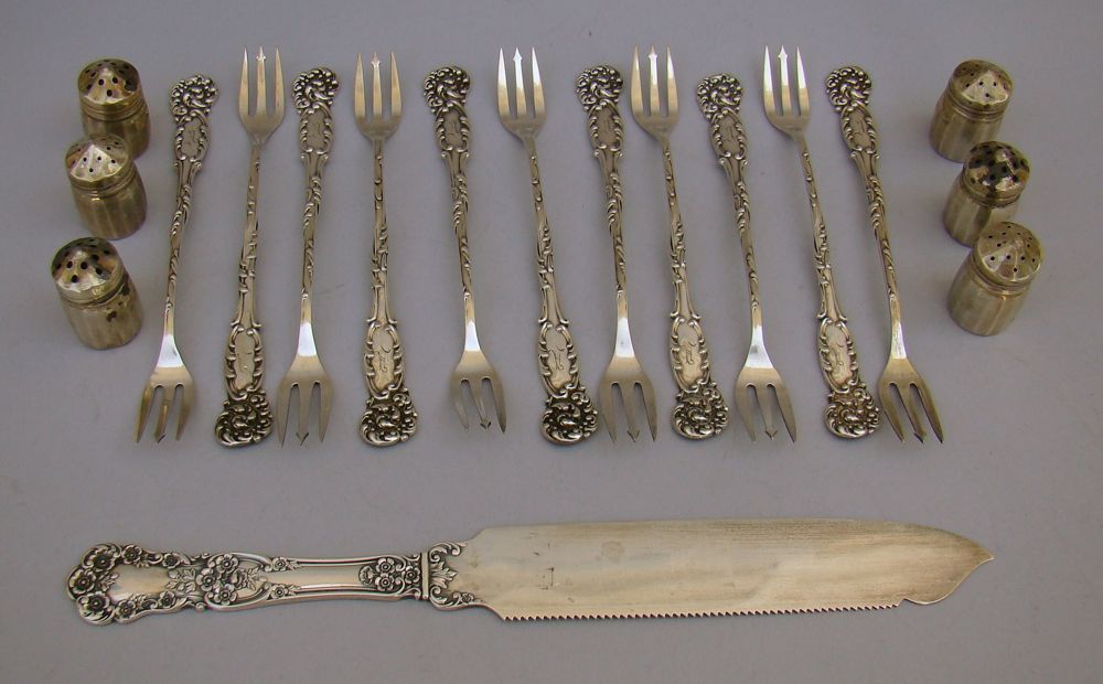 Appraisal: TWELVE PIECES OF STERLING SILVER FLATWARE Ice cream slice by