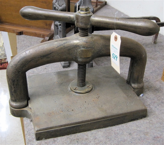 Appraisal: A HEAVY CAST IRON BOOK PRESS Eden Fisher Co Stationers