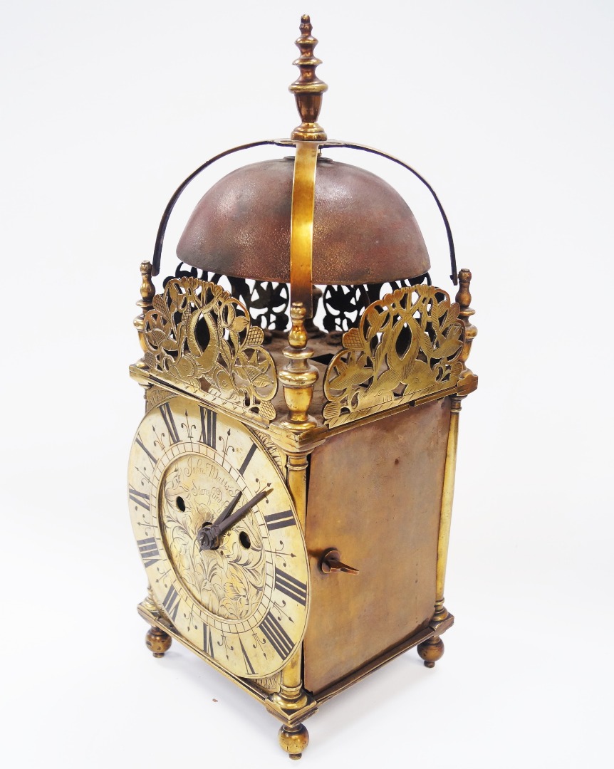 Appraisal: A brass lantern clock the engraved dial plate signed John