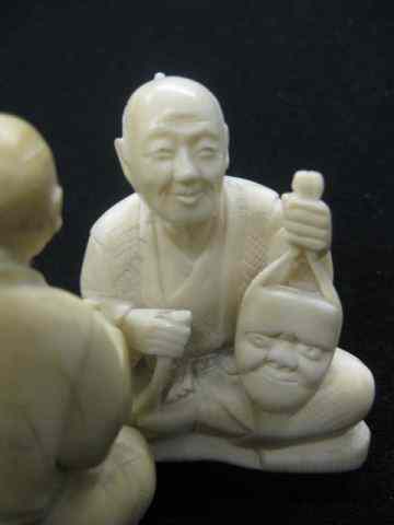 Appraisal: Chinese Carved Ivory Figurine of Two Men seated working in