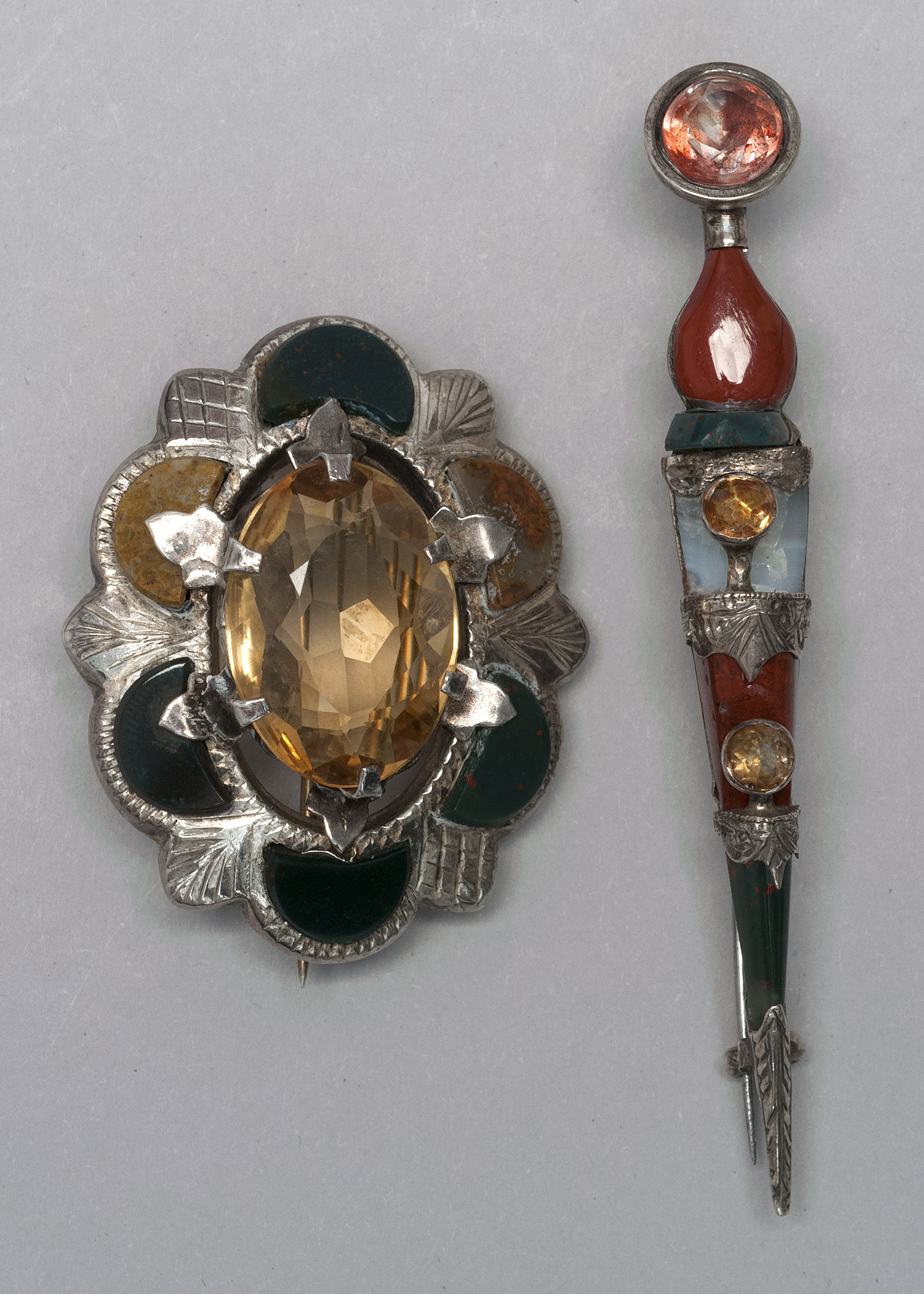 Appraisal: TWO SCOTTISH KILT PINS Early th CenturyBoth with agate stones