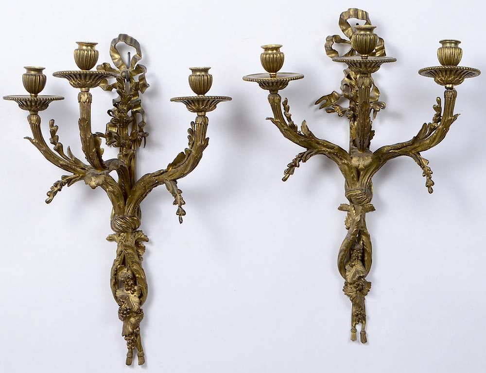 Appraisal: PAIR LOUIS XVI STYLE GILT BRONZE WALL LIGHTS Late th