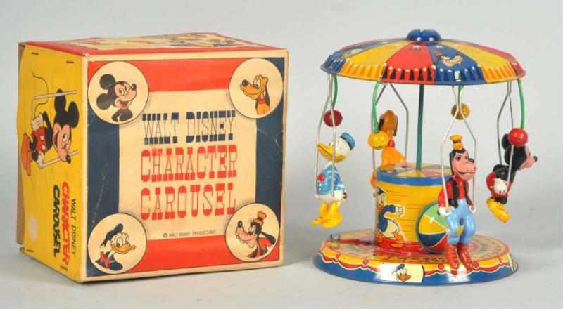 Appraisal: Tin Litho Linemar Disney Carousel Wind-Up Toy Japanese Working Figures