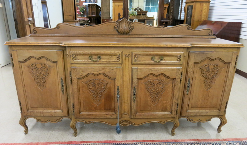 Appraisal: LOUIS XV STYLE CARVED OAK SIDEBOARD Belgian th century the