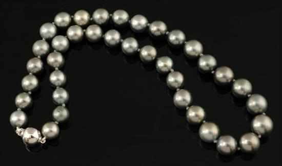 Appraisal: A strand of Tahitian pearls Comprising thirty seven pearls of