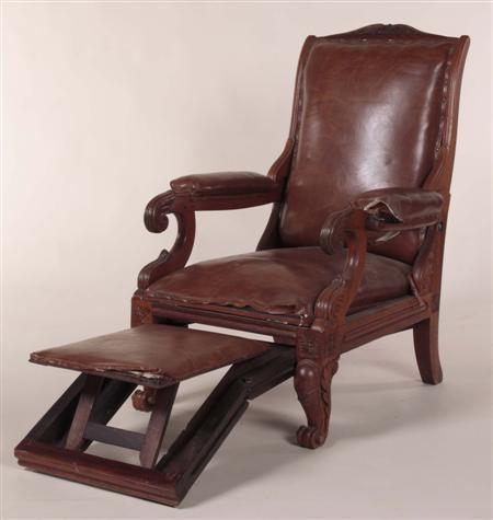 Appraisal: A Anglo-Indian gentleman's chair the carved top-rail over caned seat