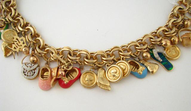 Appraisal: K Yellow gold charm bracelet '' long with six enameled