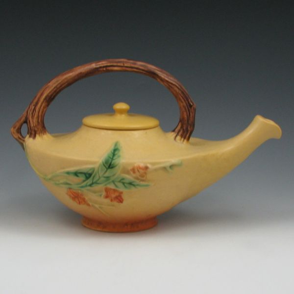 Appraisal: Roseville Bittersweet lidded teapot in yellow Marked Roseville USA P