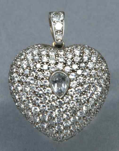 Appraisal: A DIAMOND SET LOCKET in the form of a heart