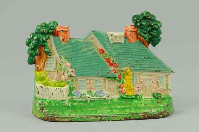 Appraisal: CAPE COD COTTAGE DOORSTOP Hubley brightly painted example quaint cottage