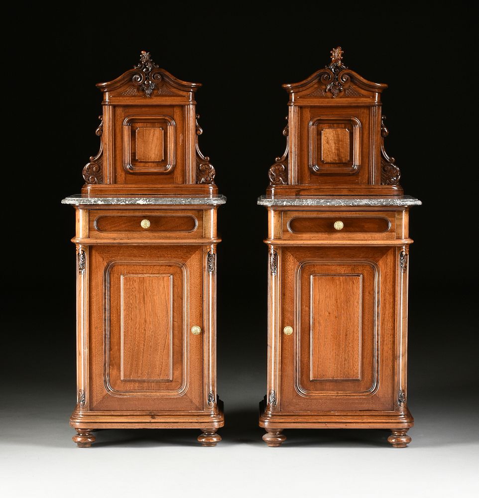 Appraisal: A PAIR OF FRENCH RENAISSANCE REVIVAL MARBLE TOPPED WALNUT BEDSIDE