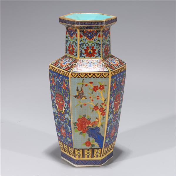 Appraisal: Elaborate Chinese enameled porcelain vase with birds flowers and masks