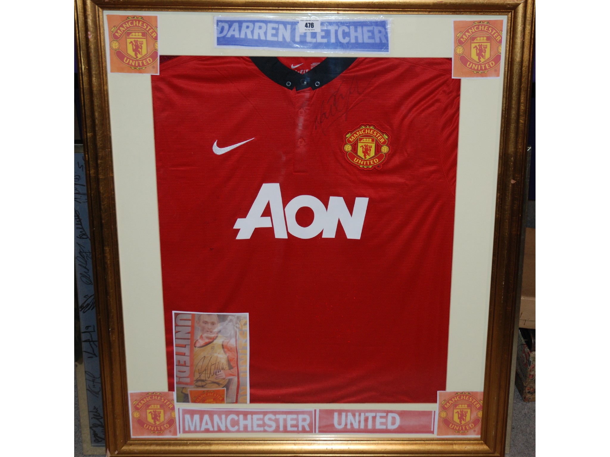 Appraisal: A red Manchester United replica shirt autographed by Darren Fletcher