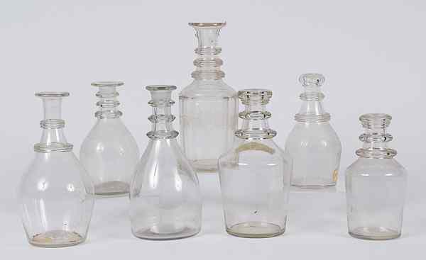 Appraisal: Blown Glass Decanters Plus American an assembled group of eight