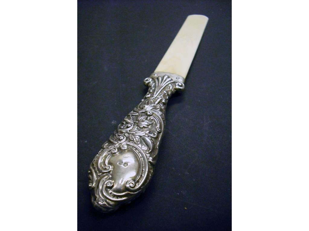 Appraisal: Victorian silver handled ivory page turner the handle embossed with