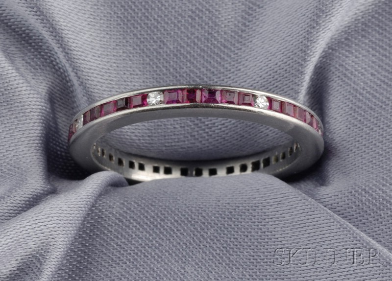 Appraisal: Platinum Ruby and Diamond Band channel-set with thirty-seven rubies and