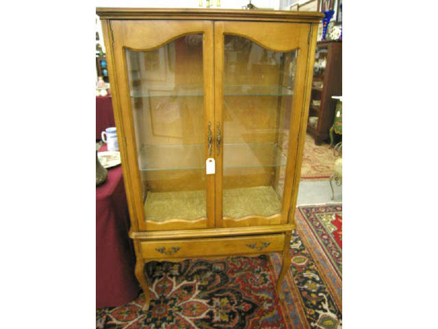 Appraisal: Maple China Cabinet double door drawer below tall wide lighted