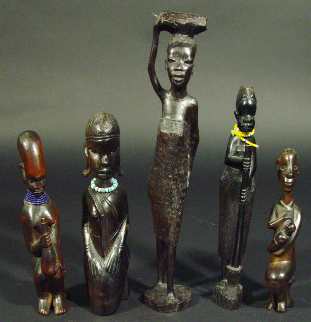 Appraisal: Five tribal hardwood female figures three with beaded jewellery the