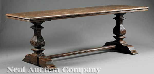 Appraisal: A Carved Walnut Refectory Table in the Renaissance style trestle