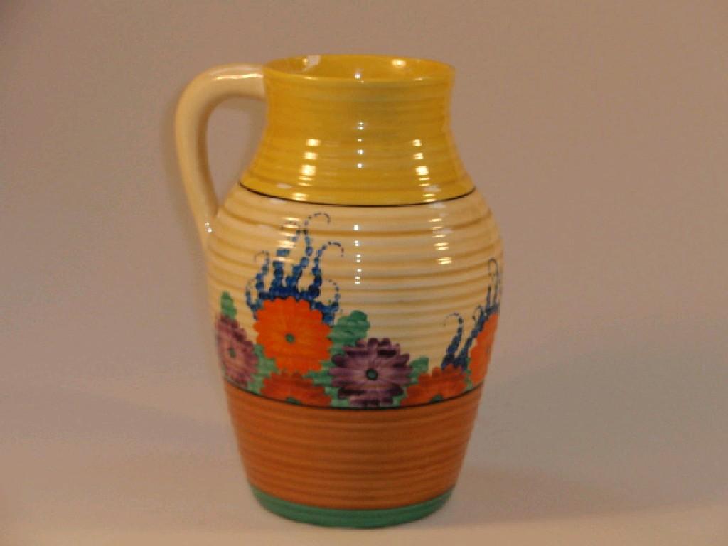 Appraisal: A Clarice Cliff Lotus jug with 'Gay Day' pattern decoration