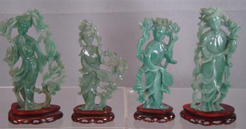 Appraisal: carved green jade courtesan figures Estimate -