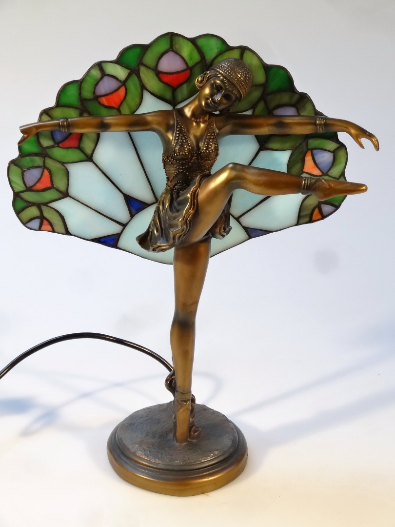 Appraisal: A modern Art Deco design lamp formed as a lady