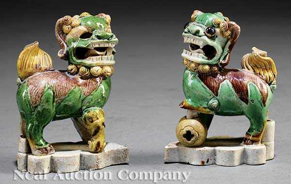 Appraisal: A Pair of Chinese Kangxi-Style Famille Verte Biscuit Glazed Buddhist