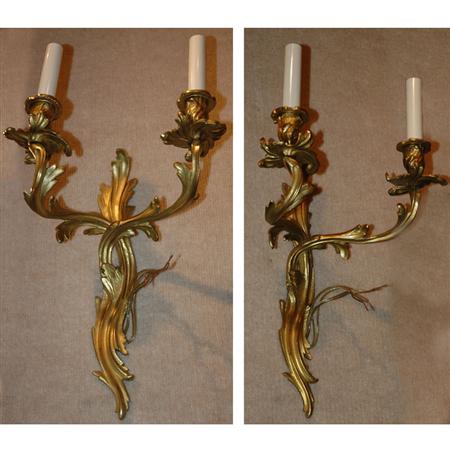 Appraisal: Pair of Louis XV Style Gilt Metal Two-Light Sconces Estimate