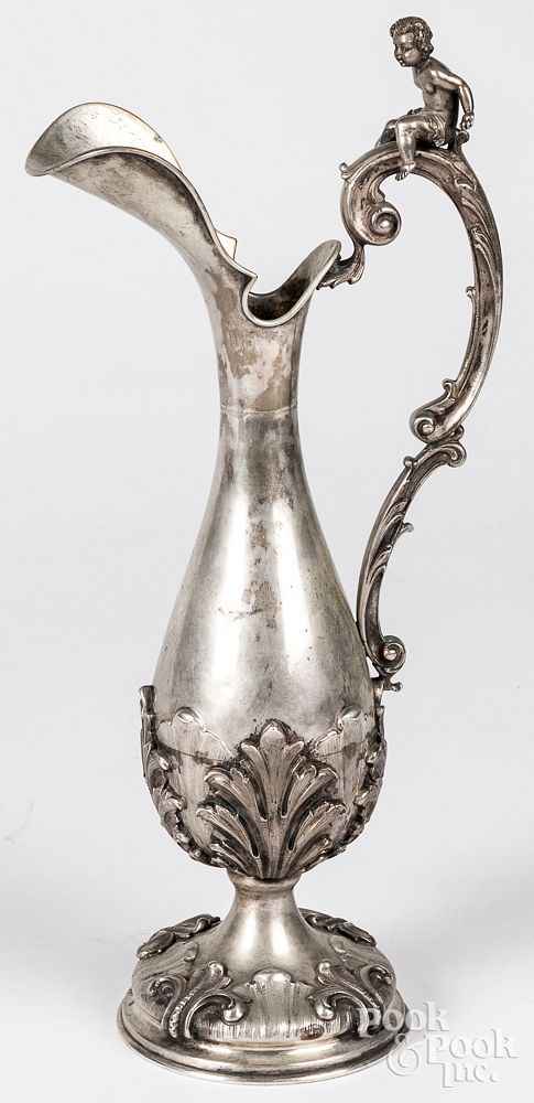 Appraisal: Unmarked silver ewer with putti finial Unmarked silver ewer with