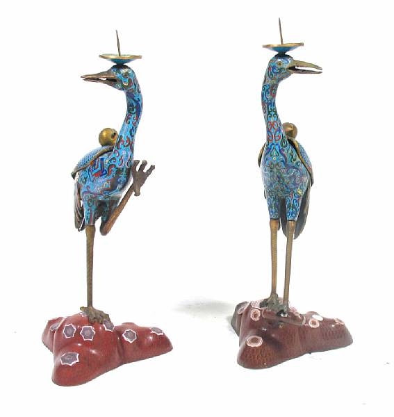 Appraisal: A pair of Chinese cloisonne figural candlesticks height in width