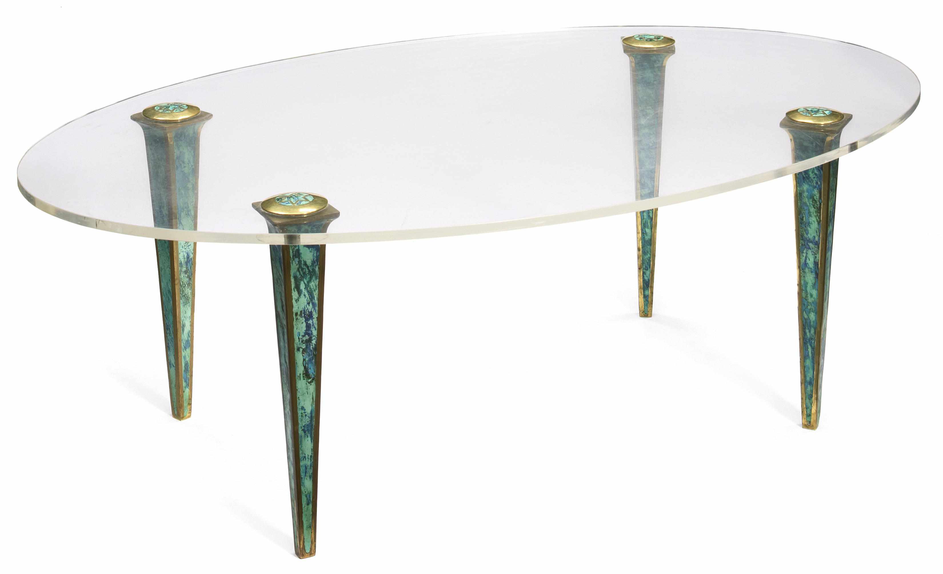 Appraisal: A patinated and enameled metal and lucite oval coffee table