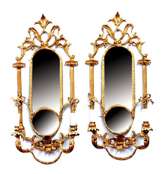 Appraisal: Pair bronze and mirrored two-light wall sconces foliate backplate with