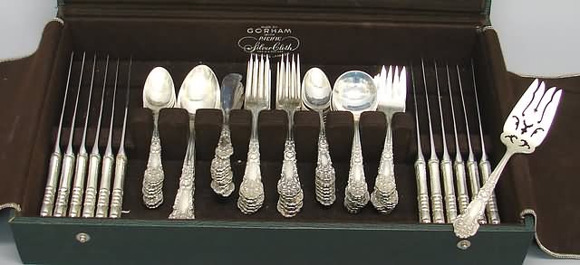 Appraisal: Richly chased floral decoration consisting of hollow-handled dinner knives teaspoons